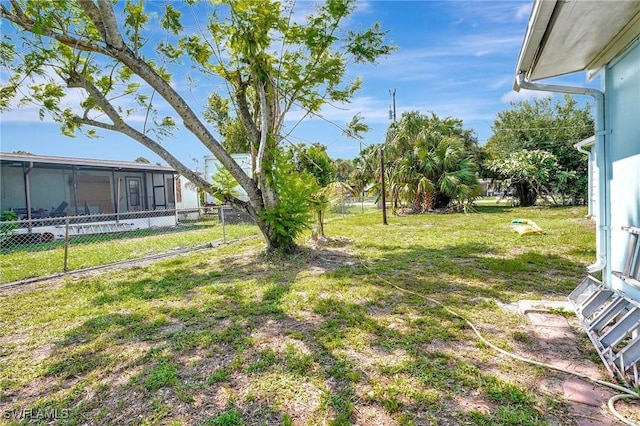 2153 Twin Brooks Rd, North Fort Myers, FL 33917 - view of yard with a sunroom