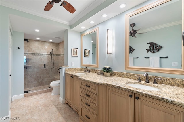 1080 S Collier Blvd Unit 103, Marco Island, FL 34145 - full bathroom with a ceiling fan, double vanity, toilet, a shower stall, and ornamental molding