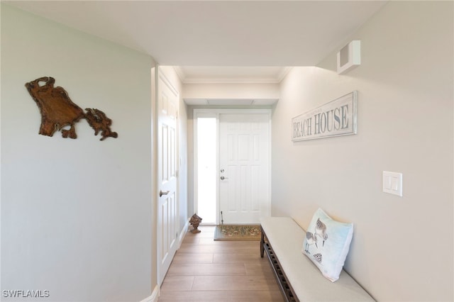 1080 S Collier Blvd Unit 103, Marco Island, FL 34145 - corridor featuring wood finished floors and crown molding