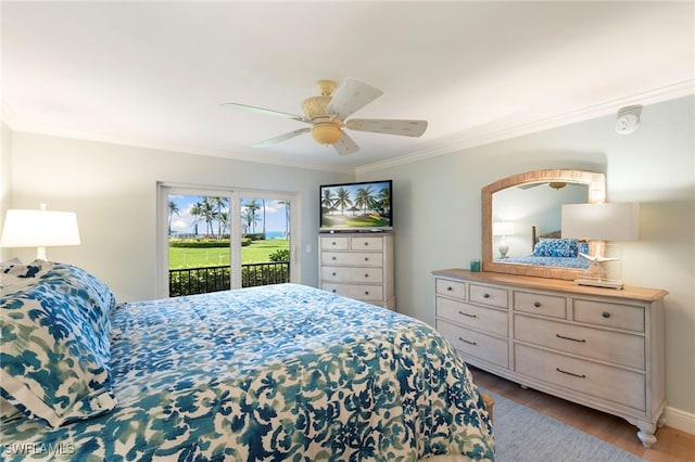 1080 S Collier Blvd Unit 103, Marco Island, FL 34145 - bedroom with access to outside, wood finished floors, crown molding, a ceiling fan, and baseboards