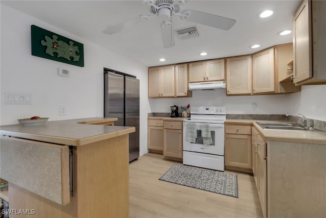 2662 Mangrove St, Naples, FL 34112 - kitchen featuring electric stove, freestanding refrigerator, under cabinet range hood, a sink, and light brown cabinets