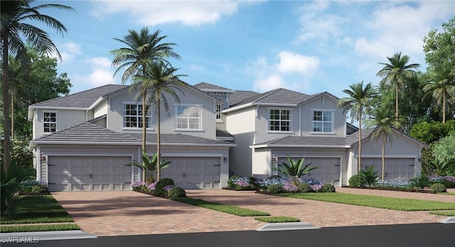 14826 Birchwood Ct Unit 6711, Punta Gorda, FL 33955 - traditional home with decorative driveway, stucco siding, and a garage