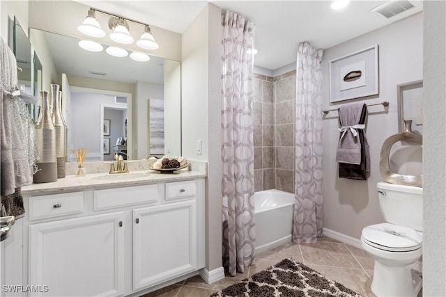 14826 Birchwood Ct Unit 6711, Punta Gorda, FL 33955 - full bathroom featuring toilet, tile patterned floors, vanity, shower / tub combo with curtain, and baseboards