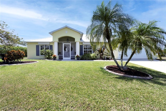 516 SE 14th Ter, Cape Coral, FL 33990 - ranch-style house featuring stucco siding, a front lawn, and concrete driveway