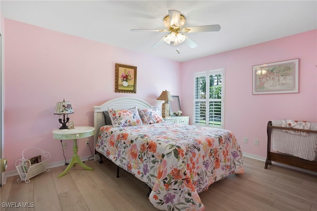 516 SE 14th Ter, Cape Coral, FL 33990 - bedroom with wood finished floors, baseboards, and ceiling fan