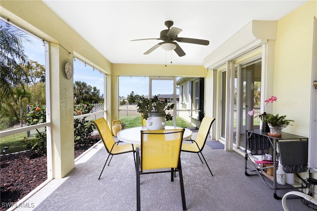 516 SE 14th Ter, Cape Coral, FL 33990 - sunroom / solarium featuring outdoor dining area, a ceiling fan, and plenty of natural light