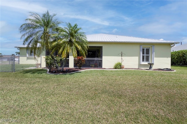 516 SE 14th Ter, Cape Coral, FL 33990 - view of home's exterior with stucco siding and metal roof