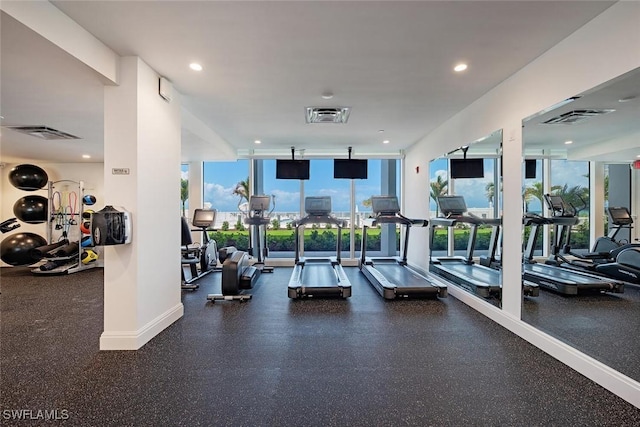 3443 Gulf Shore Blvd N Unit 409, Naples, FL 34103 - workout area featuring plenty of natural light, recessed lighting, and expansive windows