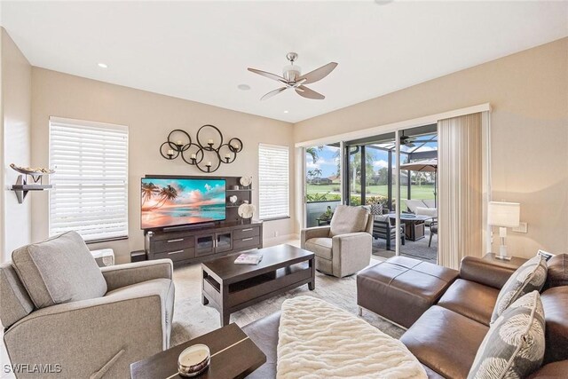 13461 Bridgeford Ave, Bonita Springs, FL 34135 - living room with ceiling fan and wood finished floors