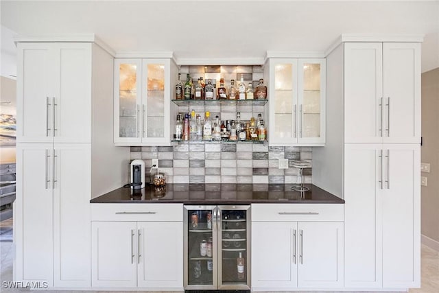 13461 Bridgeford Ave, Bonita Springs, FL 34135 - indoor dry bar featuring wine cooler and tasteful backsplash