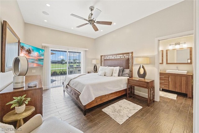 13461 Bridgeford Ave, Bonita Springs, FL 34135 - bedroom featuring access to exterior, dark wood-style floors, a sink, connected bathroom, and recessed lighting