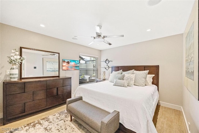 13461 Bridgeford Ave, Bonita Springs, FL 34135 - bedroom with wood finished floors, a ceiling fan, baseboards, and recessed lighting