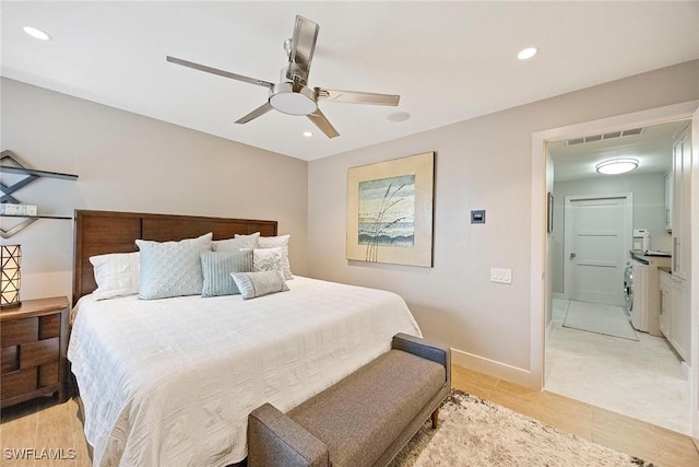 13461 Bridgeford Ave, Bonita Springs, FL 34135 - bedroom with light wood-style floors, recessed lighting, ceiling fan, baseboards, and separate washer and dryer