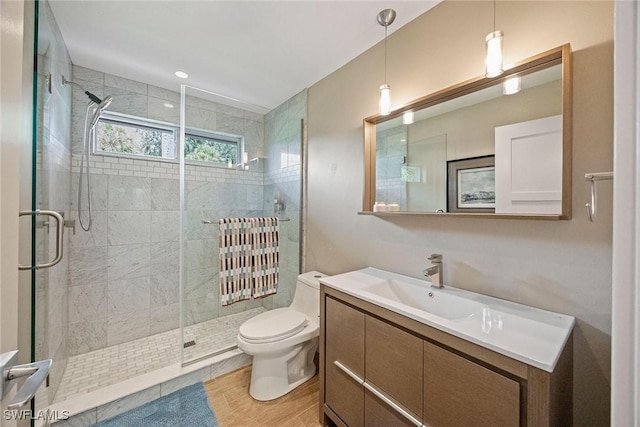 13461 Bridgeford Ave, Bonita Springs, FL 34135 - full bathroom with toilet, vanity, and a stall shower