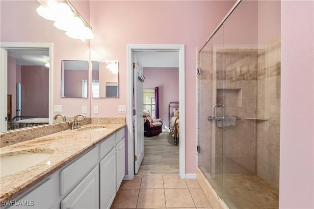15721 Beachcomber Ave, Fort Myers, FL 33908 - full bath featuring ensuite bath, double vanity, a shower stall, and tile patterned floors