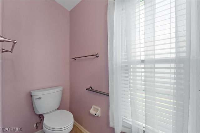 15721 Beachcomber Ave, Fort Myers, FL 33908 - bathroom with toilet and baseboards