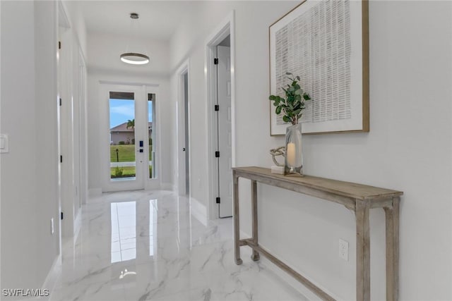 2204 SW 3rd Ter, Cape Coral, FL 33991 - corridor with marble tiled floors and baseboards