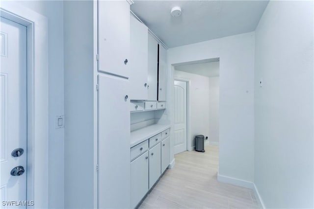 4101 Rainbow Dr, Fort Myers, FL 33916 - hallway featuring baseboards