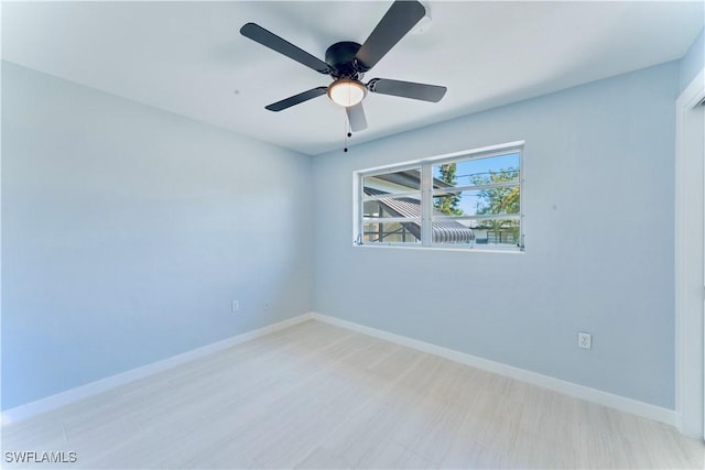 4101 Rainbow Dr, Fort Myers, FL 33916 - unfurnished room featuring baseboards and a ceiling fan