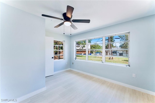 4101 Rainbow Dr, Fort Myers, FL 33916 - unfurnished room featuring baseboards and ceiling fan