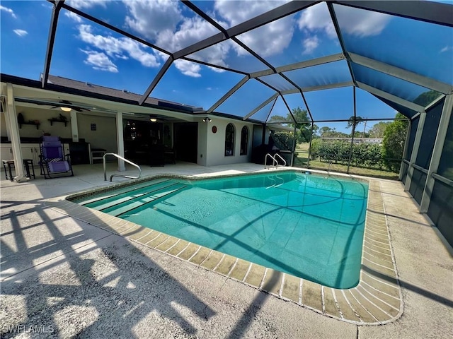 40 Ortona St, Lehigh Acres, FL 33936 - swimming pool featuring ceiling fan, a patio area, and a lanai