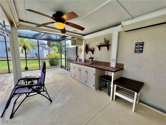 40 Ortona St, Lehigh Acres, FL 33936 - sunroom / solarium featuring a ceiling fan