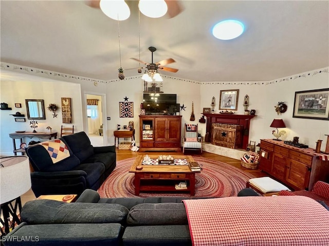 40 Ortona St, Lehigh Acres, FL 33936 - living area featuring ceiling fan, wood finished floors, and vaulted ceiling