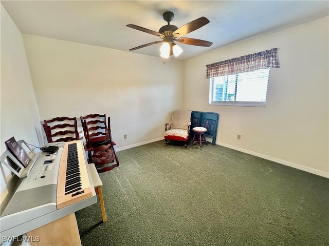 40 Ortona St, Lehigh Acres, FL 33936 - sitting room featuring a ceiling fan, carpet flooring, and baseboards