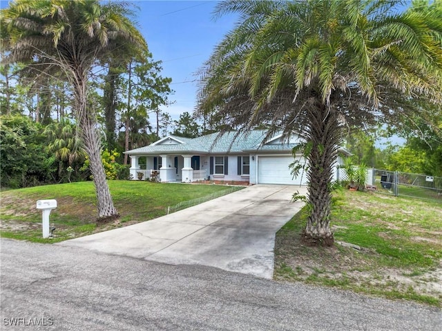 1402 Congress Ave, Lehigh Acres, FL 33972 - single story home featuring an attached garage, concrete driveway, and a porch
