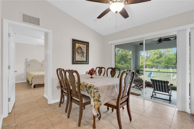 1402 Congress Ave, Lehigh Acres, FL 33972 - dining area featuring lofted ceiling, ceiling fan, light tile patterned floors, and baseboards