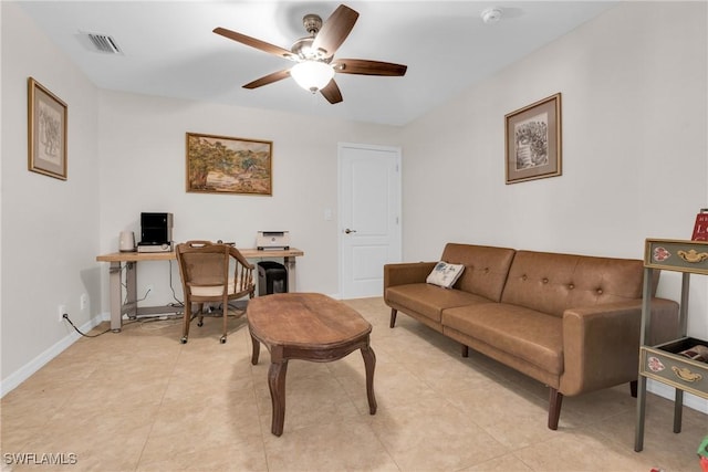 1402 Congress Ave, Lehigh Acres, FL 33972 - living room with a desk, a ceiling fan, and baseboards