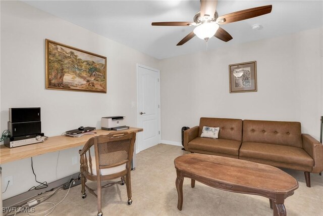 1402 Congress Ave, Lehigh Acres, FL 33972 - office area with a ceiling fan and light tile patterned flooring