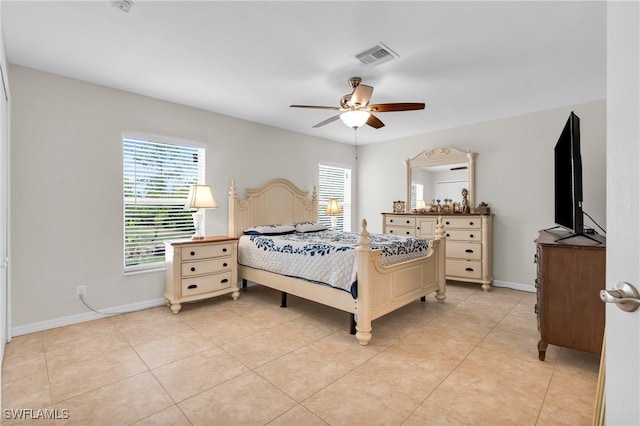 1402 Congress Ave, Lehigh Acres, FL 33972 - bedroom with baseboards, a ceiling fan, and light tile patterned flooring