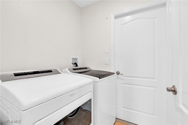 1402 Congress Ave, Lehigh Acres, FL 33972 - washroom featuring washing machine and clothes dryer