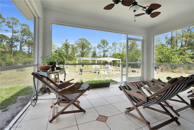 1402 Congress Ave, Lehigh Acres, FL 33972 - sunroom / solarium with ceiling fan and tile patterned flooring