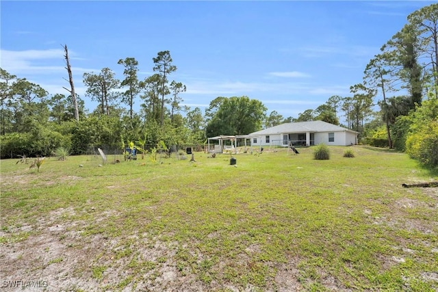 1402 Congress Ave, Lehigh Acres, FL 33972 - view of green lawn
