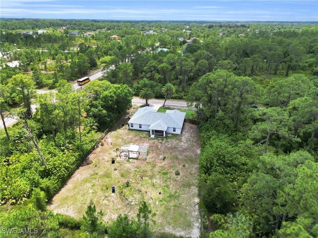 1402 Congress Ave, Lehigh Acres, FL 33972 - view of property location featuring a heavily wooded area