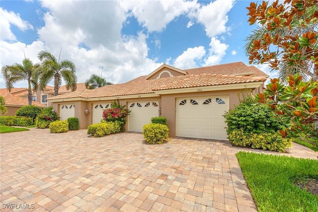 13247 Sherburne Cir Unit 1901, Bonita Springs, FL 34135 - mediterranean / spanish home featuring stucco siding and a tile roof