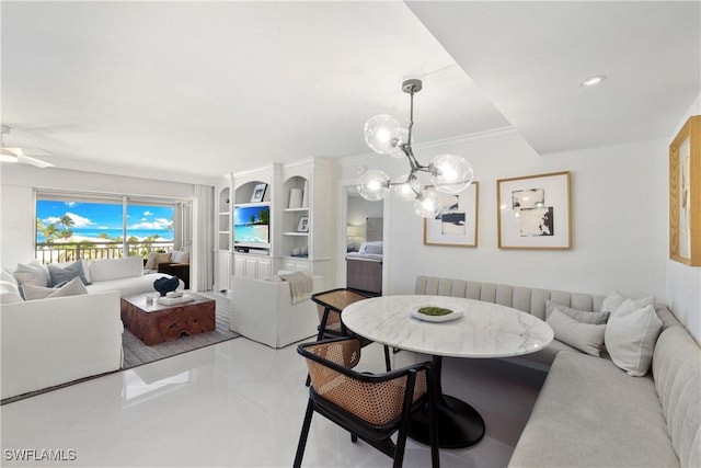 2600 Gulf Shore Blvd N Unit 54, Naples, FL 34103 - dining space with a chandelier, ornamental molding, tile patterned floors, and ceiling fan