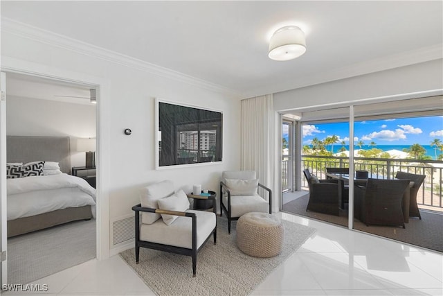 2600 Gulf Shore Blvd N Unit 54, Naples, FL 34103 - tiled bedroom with crown molding and access to exterior
