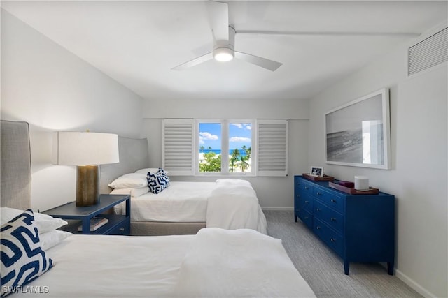 2600 Gulf Shore Blvd N Unit 54, Naples, FL 34103 - bedroom with light colored carpet, baseboards, and a ceiling fan
