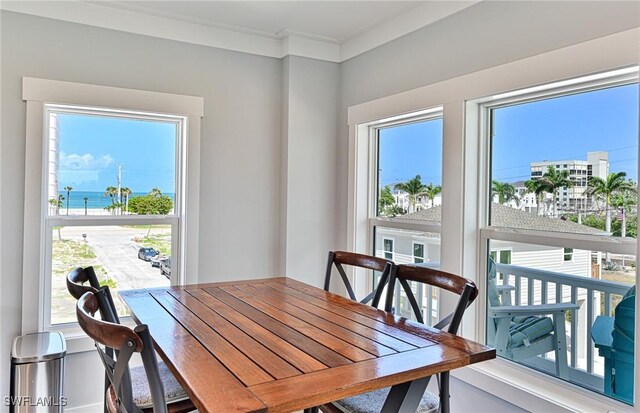 26275 Hickory Blvd Unit 26, Bonita Springs, FL 34134 - dining room featuring crown molding