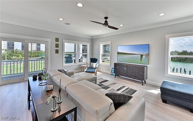 26275 Hickory Blvd Unit 26, Bonita Springs, FL 34134 - living area featuring plenty of natural light, a ceiling fan, recessed lighting, baseboards, and light wood-type flooring