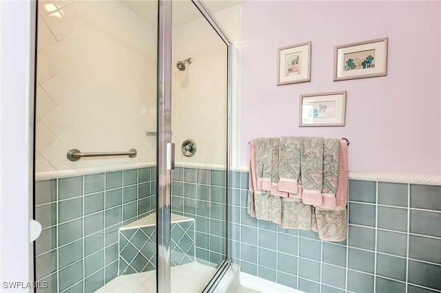10800 Palazzo Way Unit 204, Fort Myers, FL 33913 - bathroom featuring tile walls and a stall shower