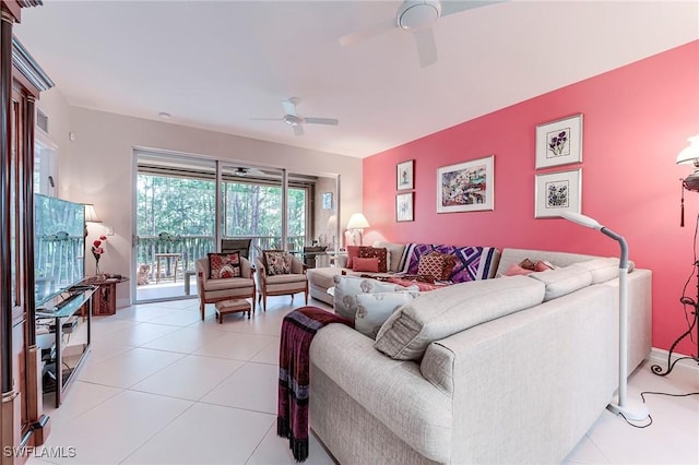 10800 Palazzo Way Unit 204, Fort Myers, FL 33913 - living area with a ceiling fan, light tile patterned floors, and baseboards