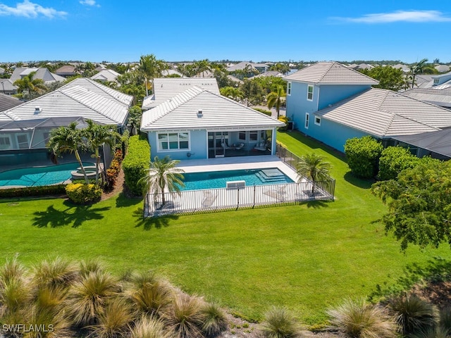 6478 Warwick Ave, Naples, FL 34113 - rear view of house with a residential view, an outdoor pool, and a tile roof