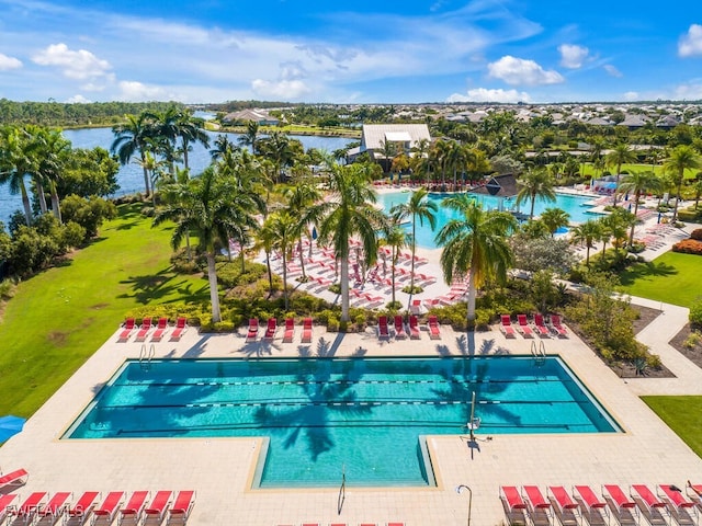 6478 Warwick Ave, Naples, FL 34113 - community pool with a water view and a patio area