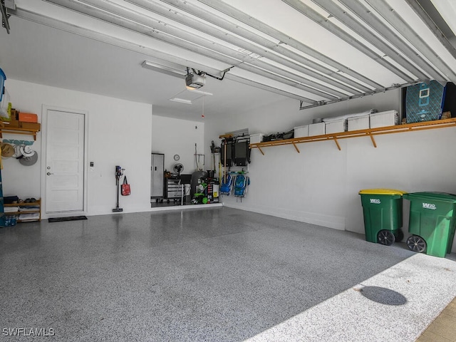 6478 Warwick Ave, Naples, FL 34113 - garage with a garage door opener