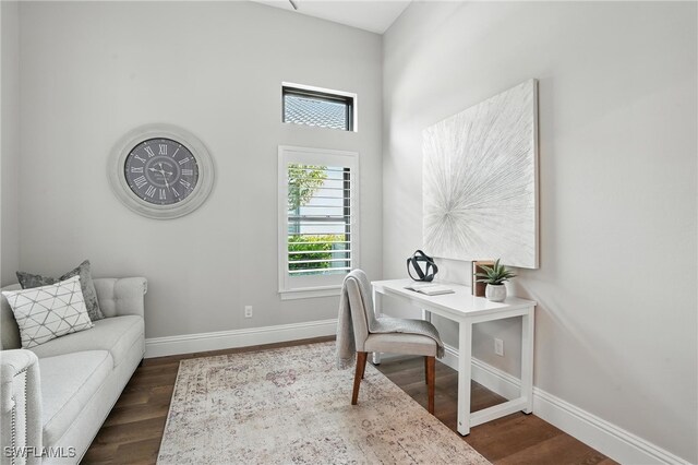 8836 Savona Ct, Naples, FL 34119 - home office with baseboards and dark wood-style flooring