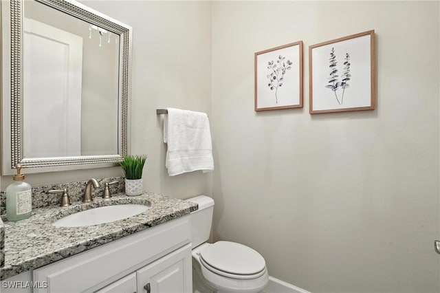 8836 Savona Ct, Naples, FL 34119 - bathroom featuring vanity and toilet